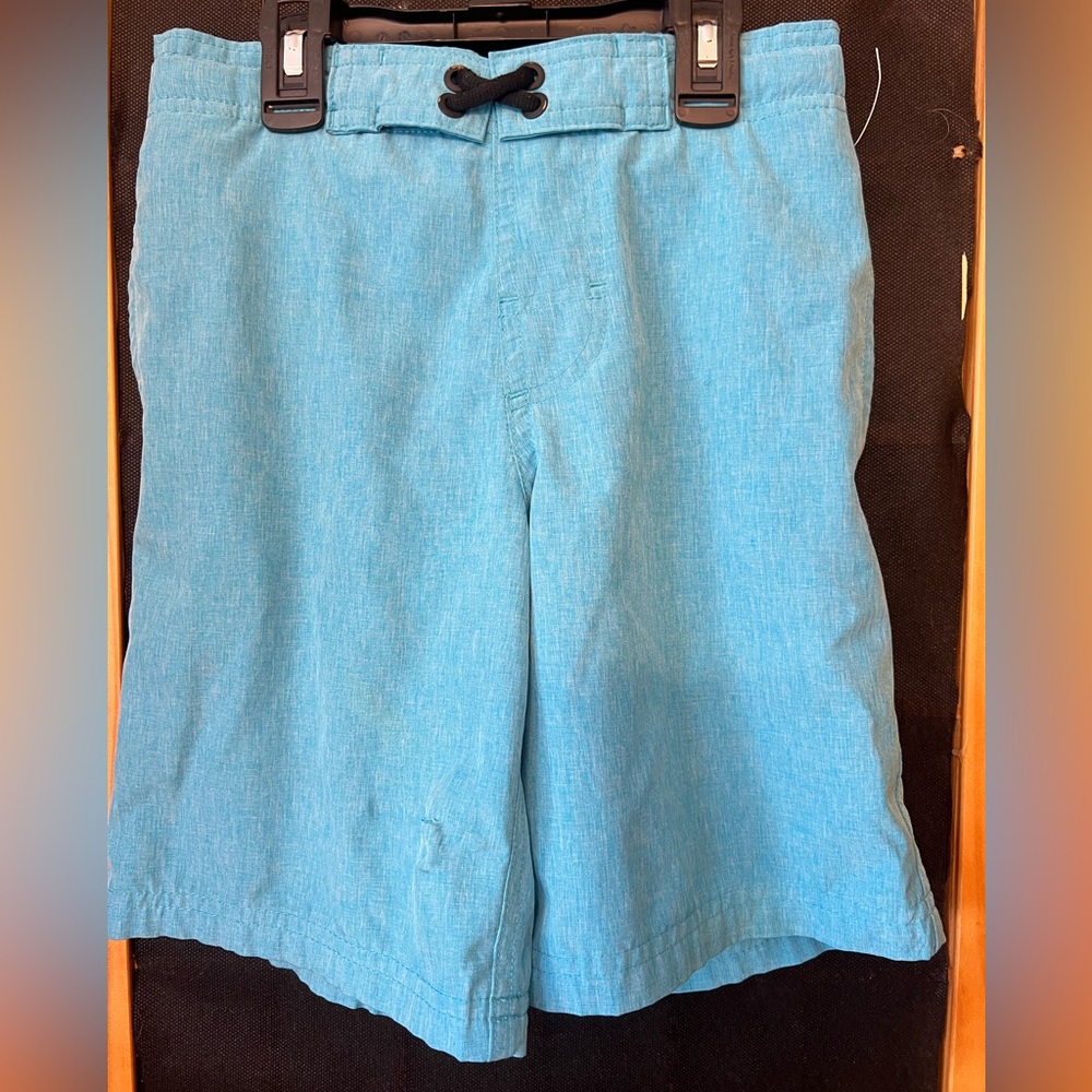 Boys swim trunk. Good condition. Item has small tear on right front side.